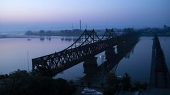 The Friendship Bridge in Dandong between China and North Korea. Before coronavirus restrictions, many North Korean women travelled back and forth across the porous border with China