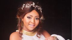 Regina Daniels and her baby