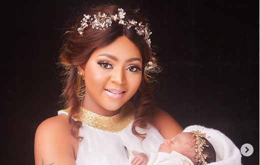 Regina Daniels and her baby