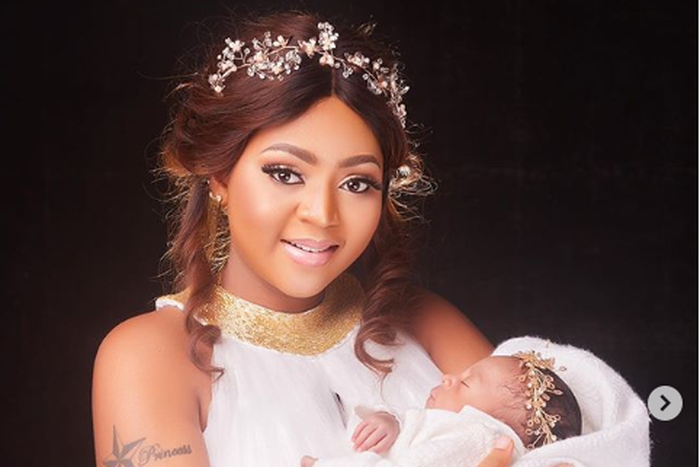 Regina Daniels and her baby