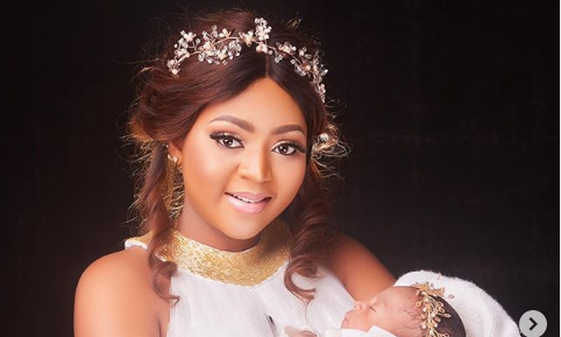 Regina Daniels and her baby