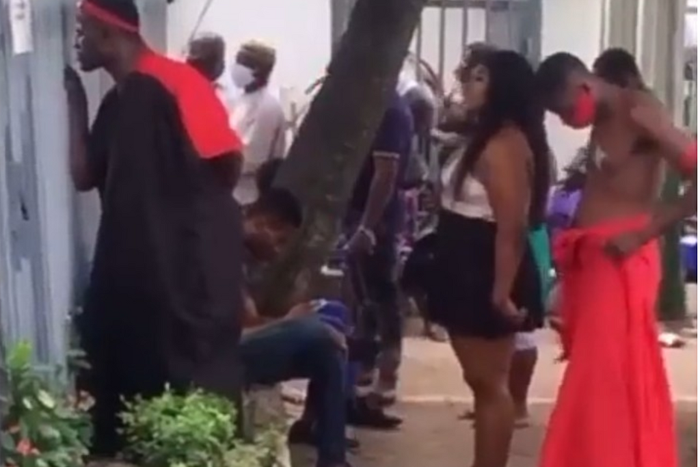 Angry lady storms bank with fetish priest to demand money deducted from her account