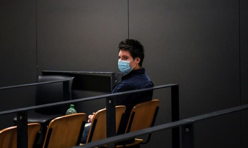 Portuguese whistleblower Rui Pinto waits for the start of his trial in Lisbon