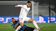 Real Madrid forward Eden Hazard (in white) has tested positive for coronavirus along with teammate Casemiro