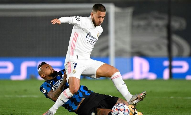 Real Madrid forward Eden Hazard (in white) has tested positive for coronavirus along with teammate Casemiro
