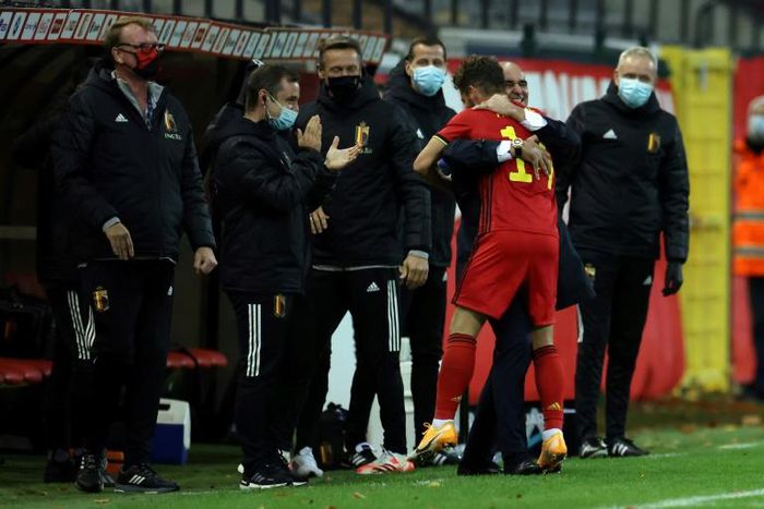 Let's celebrate: Belgium striker Dries Mertens embraces coach Roberto Martinez