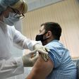 Trials on Russia's 'Sputnik V' vaccine are continuing despite foreign experts' reservations