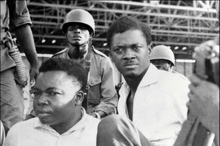Downfall: Congolese independence hero Patrice Lumumba, right, and Joseph Okito, the vice president of the senate, pictured on their arrest in December 1960 in Leopoldville, now Kinshasa