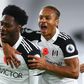 Fulham's Ola Aina (L) celebrates scoring against West Brom