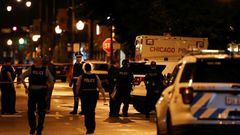 Fourteen people were wounded in the shootout outside a funeral parlor in Chicago