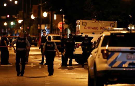 Fourteen people were wounded in the shootout outside a funeral parlor in Chicago