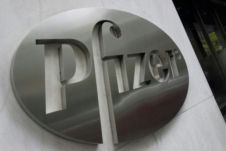 The Pfizer company logo is seen in front of Pfizer's headquarters in New York