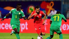 Tunisia star Taha Yassine Khenissi (C) playing against Senegal in a 2019 Africa Cup of Nations semi-final in Egypt