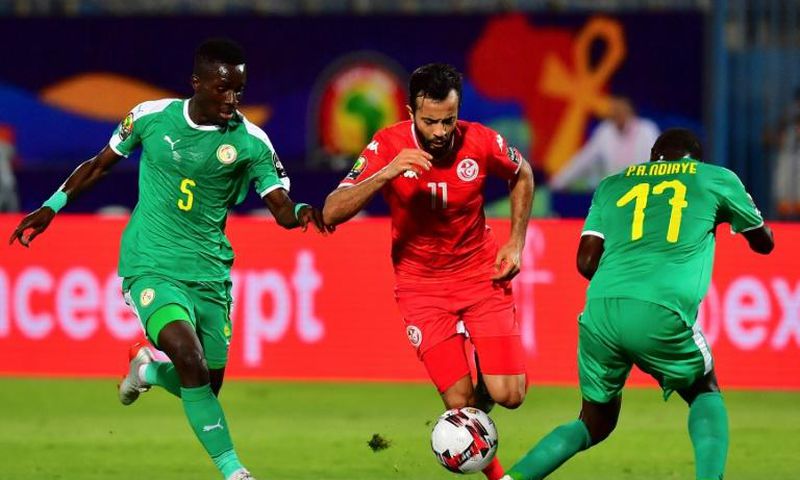 Tunisia star Taha Yassine Khenissi (C) playing against Senegal in a 2019 Africa Cup of Nations semi-final in Egypt