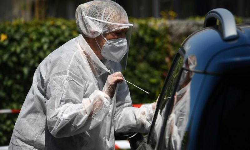 Positive vaccine news comes as some countries start to reintroduce virus control measures