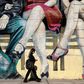 A woman walks past a mural featuring tango dancers in Buenos Aires