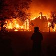 A home burns in Vacaville, California, as the fast-moving fires in the Golden State have prompted widespread evacuations