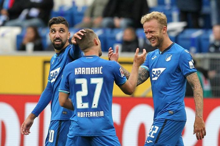 Hoffenheim defender Kevin Vogt (R) is the German club's eighth case of the coronavirus after a cluster outbreak