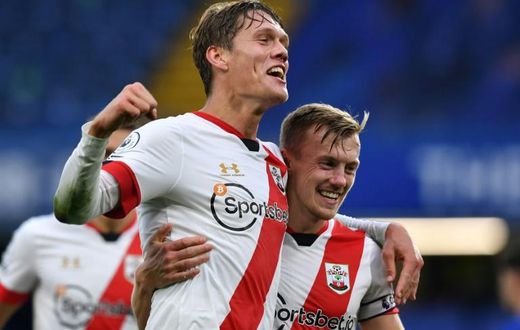 Southampton defender Jannik Vestergaard (L) celebrates scoring against Chelsea