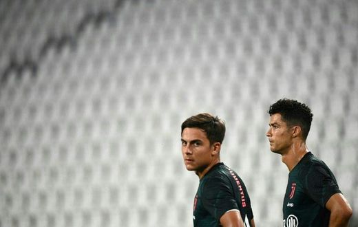 Paulo Dybala (L) and Cristiano Ronaldo (R) have been reported to prosecutors for breaking isolation.