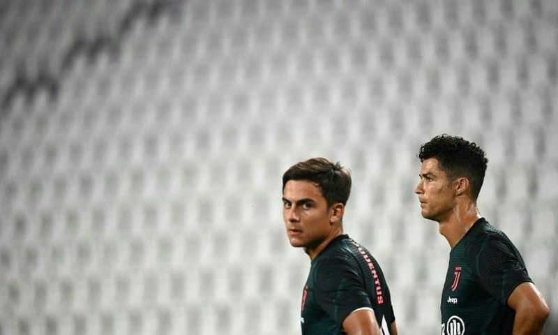 Paulo Dybala (L) and Cristiano Ronaldo (R) have been reported to prosecutors for breaking isolation.