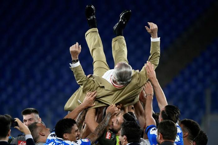 Napoli's players threw President Aurelio De Laurentiis in the air after winning the Italian Cup in June