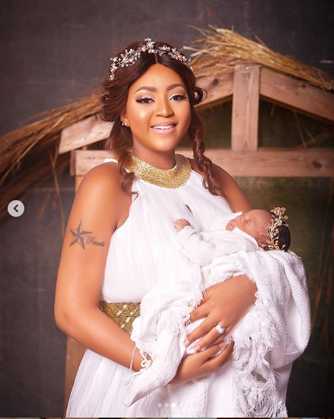 Regina Daniels and her baby
