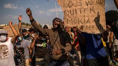 Protests by the migrants erupted on Lesbos on Saturday