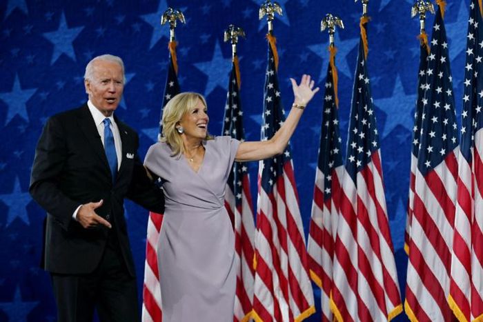 Jill Biden and Democratic presidential nominee Joe Biden stand on stage at the Chase Center in Wilmington, Delaware, at the conclusion of the Democratic National Convention, held virtually amid the novel coronavirus pandemic, on August 20, 2020