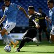 Inter Milan's Argentine forward Lautaro Martinez scores against Lazio