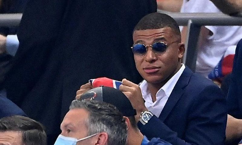 A dapper Kylian Mbappe watches Friday's French League Cup final from the stand -- the striker missed PSG's clash with Lyon because of an ankle injury