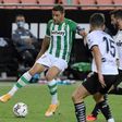 Real Betis provisionally moved atop La Liga with a 2-0 victory over Valencia on Saturday, Joaquin Sanchez (L) playing a crucial role in each goal