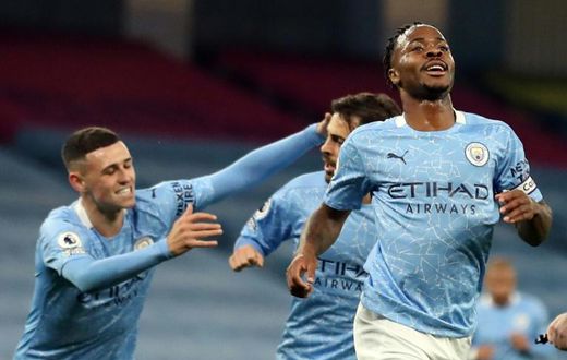 Raheem Sterling (right)opened the scoring for Manchester City against Arsenal