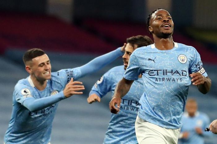 Raheem Sterling (right)opened the scoring for Manchester City against Arsenal