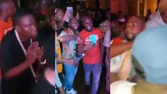 davido smacks fan's phone after Accra clubbing