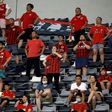 Shanghai SIPG fans watch their side's match against Beijing Guoan in Suzhou, while keeping a social distance