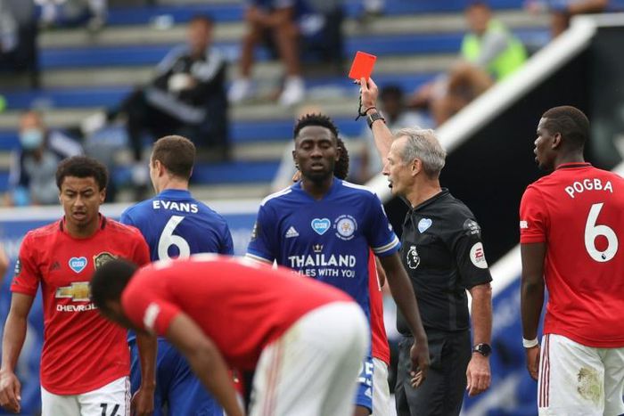 Footballers risk being sent off if a referee considers they coughed deliberately at an opponent or a match official under new guidelines from rule makers IFAB