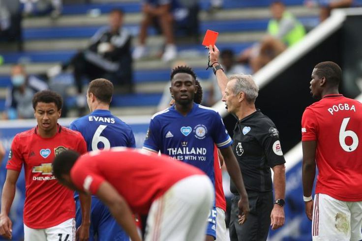 Footballers risk being sent off if a referee considers they coughed deliberately at an opponent or a match official under new guidelines from rule makers IFAB