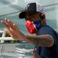 A masked Neymar leaves Paris Saint-Germain's hotel in Lisbon on Friday, as the French side prepare for the Champions League final against Bayern Munich this weekend
