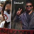 Algerians carry portraits of journalist Khaled Drareni during a rally to protest against his imprisonment in the capital Algiers on September 7