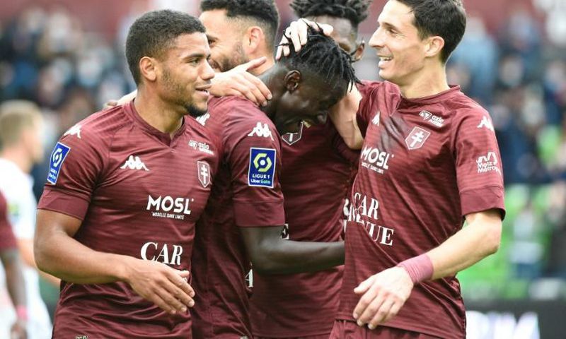 Senegalese Ibrahima Niane (C) celebrates one of his goals for Metz in a Ligue 1 hat-trick against Lorient.