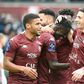Senegalese Ibrahima Niane (C) celebrates one of his goals for Metz in a Ligue 1 hat-trick against Lorient.
