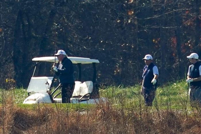 President Donald Trump participates in a round of golf at the Trump National Golf Course on Saturday, Nov. 7, 2020, in Sterling, Virginia.