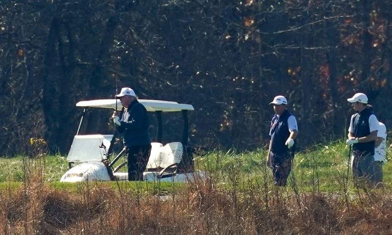 President Donald Trump participates in a round of golf at the Trump National Golf Course on Saturday, Nov. 7, 2020, in Sterling, Virginia.