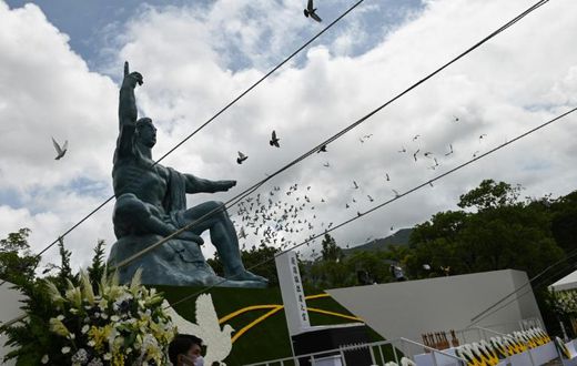 Doves fly during a ceremony marking the 75th anniversary of the atomic bombing of Nagasaki, at the city's Peace Park