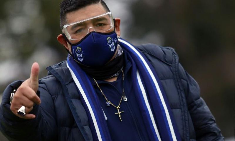 Diego Maradona (pictured September 2020) was hospitalized in Argentina, but his doctor ruled out any link to the coronavirus