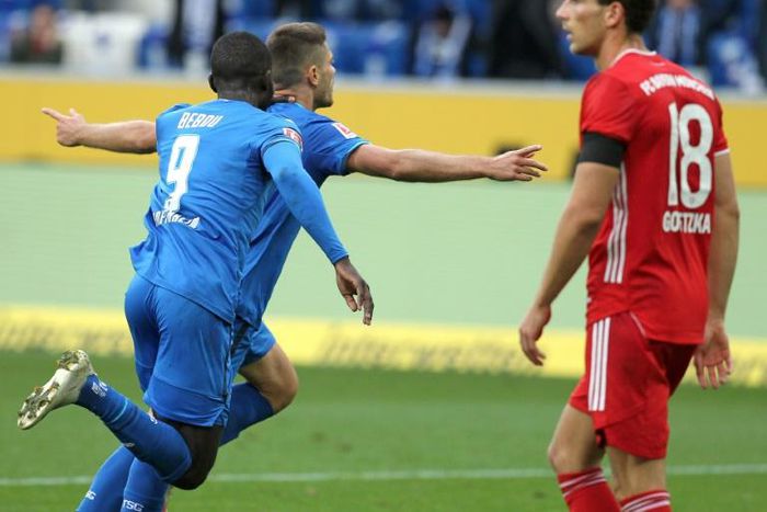 Hoffenheim striker Andrej Kramaric (C) celebrates converting a late penalty to seal a 4-1 win over Bayern Munich