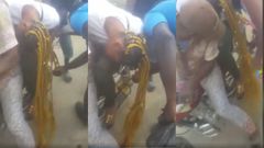 Lady’s long hair gets entangled in the wheels of motorbike