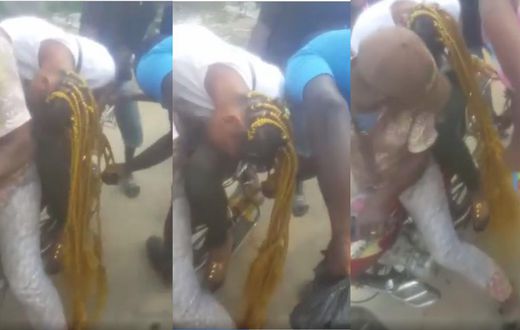Lady’s long hair gets entangled in the wheels of motorbike