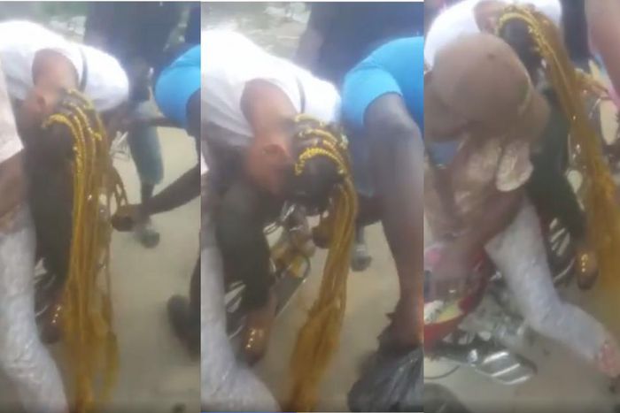 Lady’s long hair gets entangled in the wheels of motorbike
